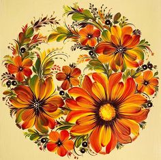 a painting of orange and yellow flowers in a circle