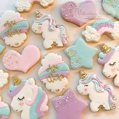 decorated cookies in pastel colors with unicorns and stars