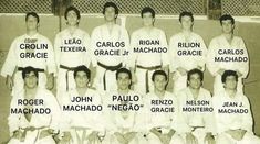 an old photo of the men's tennis team in their white uniforms and names