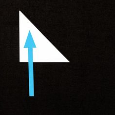 an arrow pointing to the right on a black background with white and blue arrows in it