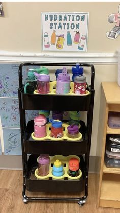 there is a shelf with cups and other items on it