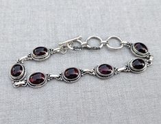 Natural Garnet Gemstone Bracelet* Oval Shape Bracelet* 925 Sterling Silver Bracelet* Adjustable Bracelet* Amazing Bracelet* Gift For Love ---------------------------------------------------------------------------------------------------------------------------------------------------- Description Metal :- 925 Sterling Silver Style : Bracelet Benefits Of Garnet    Garnet is an excellent gemstone to regulate blood circulation in body. ... It has the property to reduce the chances of hemorrhages a Chakra Racine, Gift For Love, Silver Bracelets For Women, Garnet Bracelet, Jewelry Accessories Ideas, Funky Jewelry, Jewelry Lookbook, Moon Jewelry, Silver Style