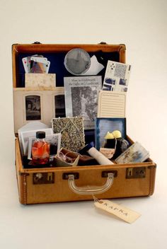 an open suitcase with various items inside it