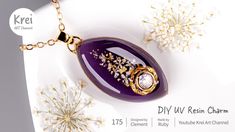 an image of a purple necklace with flowers on the front and back of it, in gold