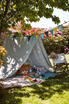 a tent is set up in the grass