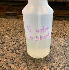 a plastic water bottle with writing on it