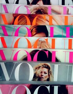 a stack of magazines with the covers pulled back to reveal an image of a woman's face