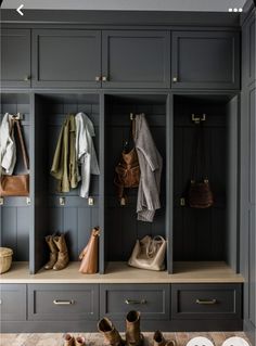 an open closet with shoes and purses on the floor