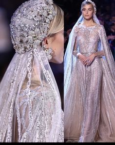 a woman in a wedding dress with veil and headpieces on the catwalk