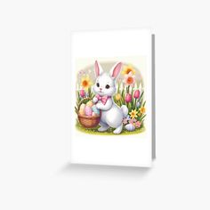 a white bunny holding an easter egg in the grass with flowers and tulips