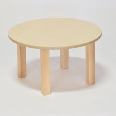 a round wooden table with two legs