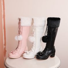 Big Sizes Harajuku Kawaii Aesthetic Sweet Lolita Pom Pom Fur Trim Lolita Knee High Boots Step into a world of enchantment with the Women's Kawaii Knee High Lace-Up Pink Lolita Boots – where fashion meets fantasy. These knee high boots are a nod to lolita fashion, designed with inclusive sizing ranging from US 4.5 to 12, ensuring that every fashionista can indulge in the magic. The perfect winter boots for your lolita coordinates, they offer a harmonious blend of elegance and warmth. The whimsical touch of these boots lies in the detachable fur trim, allowing you to customize your look and experiment with different styles. Available in a charming pink, ideal for classic and sweet lolita ensembles, as well as a pristine white for classic lolita aficionados, and black for those embracing goth Winter Princess, Princess Shoes, Winter Warmers, Sweet Lolita, Fur Boots, High Heel Boots, Chunky Heel, Look Cool, Chunky Heels