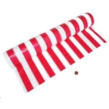 red and white striped candy canes are lined up