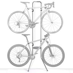 a bicycle is mounted on the side of a metal pole with four bikes attached to it