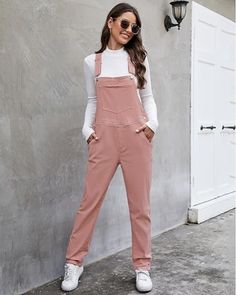 Fashion Trends // Show off your classic style wearing this light pink adjustable straps denim bib overalls.