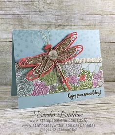 a card with a dragonfly on it and some flowers in the background that says, enjoy your special day