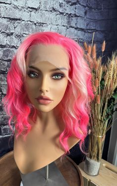 "This wig is for a person with a colorful heart! An exquisite hand tied wig with color to die for! She has gradient bright neon pink with pinkish white balayage that make a unique blend.  Transparent film lace frontal keeps the hairline realistic for any skin tone, from ear to ear and 4\" back. She is 12-14\" all around, layered with a soft and gentle shape that accentuates her loose wave.  Two mini combs in front, and one at the nape.  Super easy to care for fibers have a style memory and are h Wig With Color, White Balayage, Pastel Pink Wig, Wig Frontal, Colorful Wig, Hair Color Pastel, Wig Short, Baby Hairs, Pink Wig