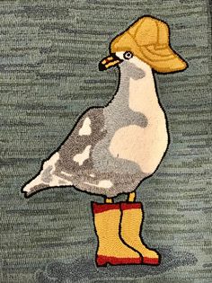 a painting of a bird with yellow boots