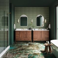 a bathroom with two sinks, mirrors and a bathtub next to a walk in shower