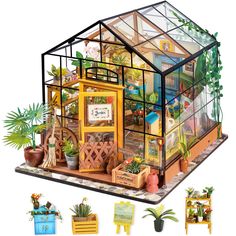 a doll house with plants and potted plants in front of it, on a white background