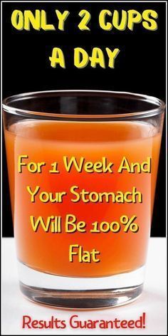 a glass cup filled with liquid next to the words, only 2 cups a day for 1 week and your stomach will be 100 % flat