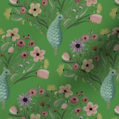 a green wallpaper with flowers and birds on it