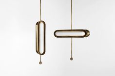 two metal objects hanging from the ceiling