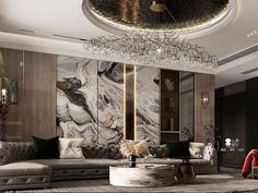 an elegant living room is decorated in black, white and gold colors with chandelier