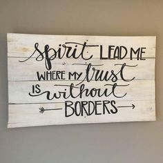 a wooden sign that says spirit lead me where my trust is without borders on it