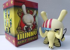 an elephant figurine is next to a box for dunkin'donuts