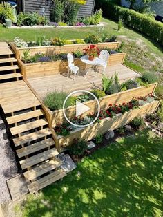 an aerial view of a wooden deck and garden