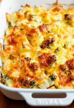 a casserole dish with broccoli and cheese