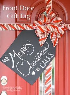 a christmas door hanger with a sign on it that says front door gift tag