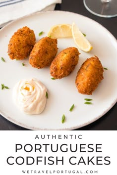 Salt cod fritters served on a plate with spicy mayo and lemon slices. Cod Fish Croquettes, Salted Cod Fish Cakes, Salt Cod Recipes Portuguese, Shredded Fish Recipes, Portuguese Fish Cakes, Cod Breakfast Recipes, Bacalhau Recipes Portuguese Cod Fish, Cod Fish Cakes With Potato