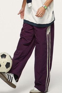 Price: $39.00 Material: 100% Nylon Size: S, M, L, XL, 2XL Color: Purple, Applicable Season: Spring, Summer Nylon Wide Leg Parachute Pants For Sports, Wide Leg Nylon Parachute Pants For Sports, Baggy Sporty Parachute Pants For Outdoor Activities, Sporty Baggy Parachute Pants For Outdoor Activities, Wide Leg Sporty Sweatpants For Outdoor, Sporty Wide Leg Sweatpants For Outdoor, Sporty Wide-leg Sweatpants For Outdoor, Casual Nylon Bottoms With Elastic Side Panels, Baggy Nylon Parachute Pants For Sporty Look