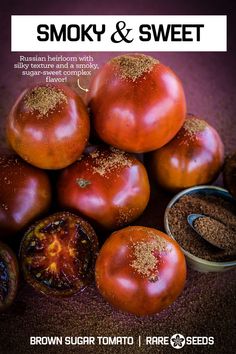 a pile of tomatoes sitting on top of each other next to some seasoning powder