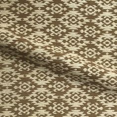 a brown and white patterned fabric