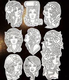 some stickers that are on the back of a cell phone, with an image of women's faces