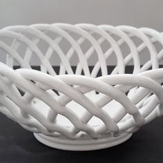 a white bowl sitting on top of a table