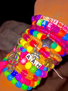 colorful bracelets with peace signs and beads