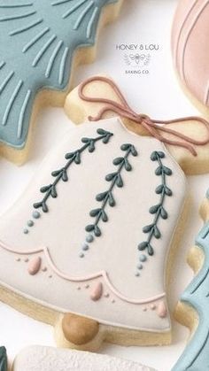 decorated cookies with blue and pink decorations on them