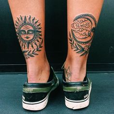 a woman's legs with sun and moon tattoos on them