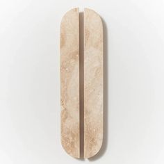 two pieces of marble on top of each other in the shape of a rectangle