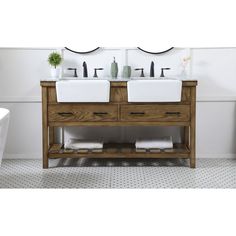 two sinks are shown in front of a mirror and white tile floored bathroom walls