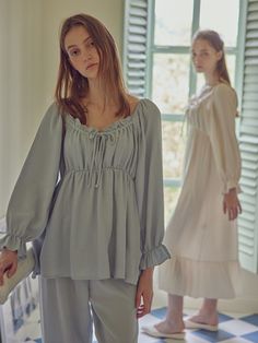 Editor's Notes The two piece pajama set has a soft, romantic pastel color and a lovely ribbon and ruffles at the neckline. - Comfortable wear with a waistband- Ruffles on the bottom hem- Loose, comfortable fit- Shirring on shoulders and chestMeasurements(in.)M / LTop- Length: 23.03 in. / 23.81 in.- Chest: 16.53 in. / 17.51 in.- Sleeve: 23.03 in. / 23.52 in.Bottom- Length: 36.02 in. / 37.01 in.- Rise: 12.01 in. / 12.40 in.- Hip: 8.36 in. / 22.24 in.- Waist: 12.59 in. / 13.38 in.*Price v Feminine Long Sleeve Ruffled Sleepwear, Feminine Long Sleeve Sleepwear With Ruffles, Spring Ruffled Sleepwear For Loungewear, Ruffled Long Sleeve Sleepwear For Loungewear, Long Sleeve Ruffled Sleepwear For Loungewear, Two Piece Pajama Set, Christmas Pajamas, Mens Outerwear, Men Shoes Size