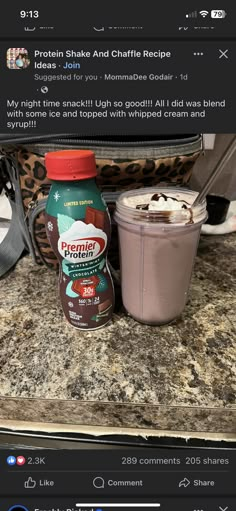 a bottle of protein drink next to a container of yogurt on a counter