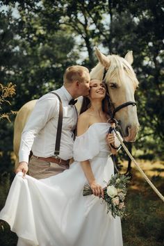 a bride and groom pose with their horse