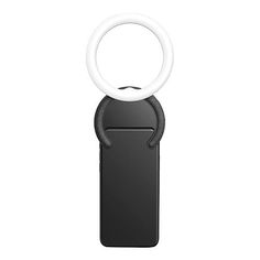 an electronic device with a ring attached to the back of it's holder, on a white background