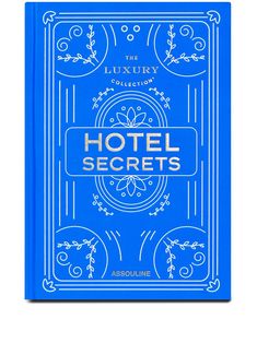 the luxury collection hotel secrets book is blue and has an ornate design on it's cover