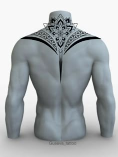 the back of a man's body with an intricate tattoo design on his chest